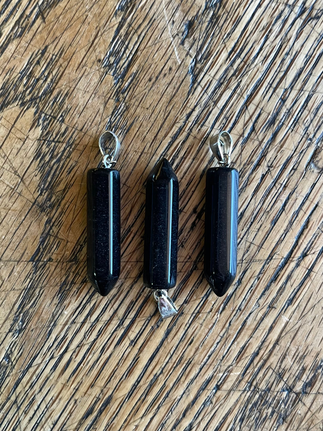 Obsidian point pendants
